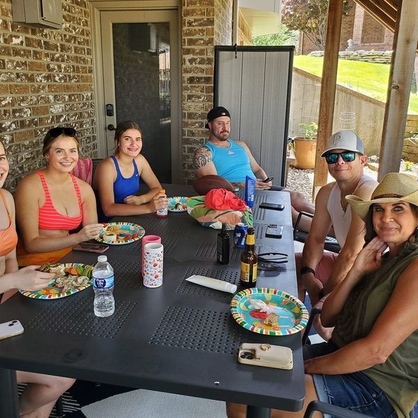 Family lunch around the patio table