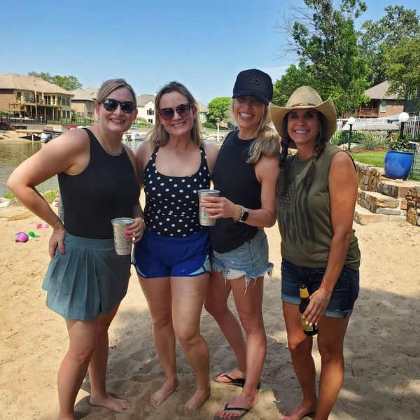 Group of family on the beach with drinks