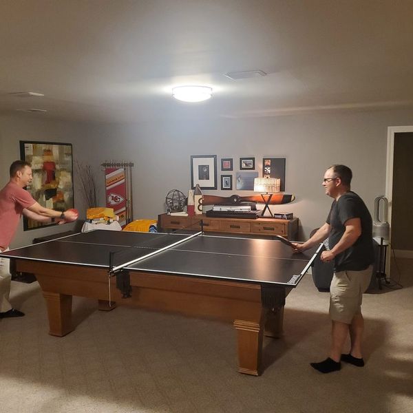 Ping pong game in the basement
